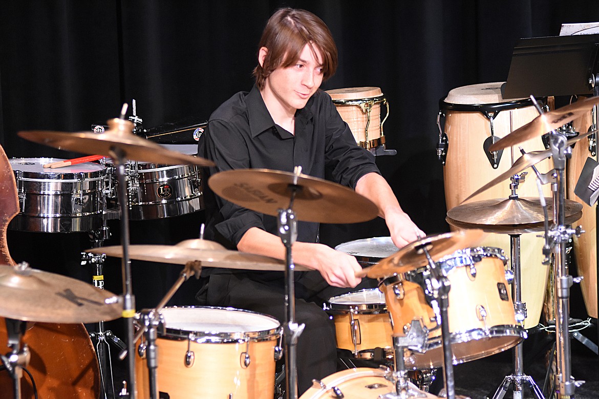 Student Caden Means plays the drums during a recent performance at Whitefish High School. The high school Percussion Ensembel and Birdland Jazz Combo performed for Muldown Elementary students. (Heidi Desch/Whitefish Pilot)