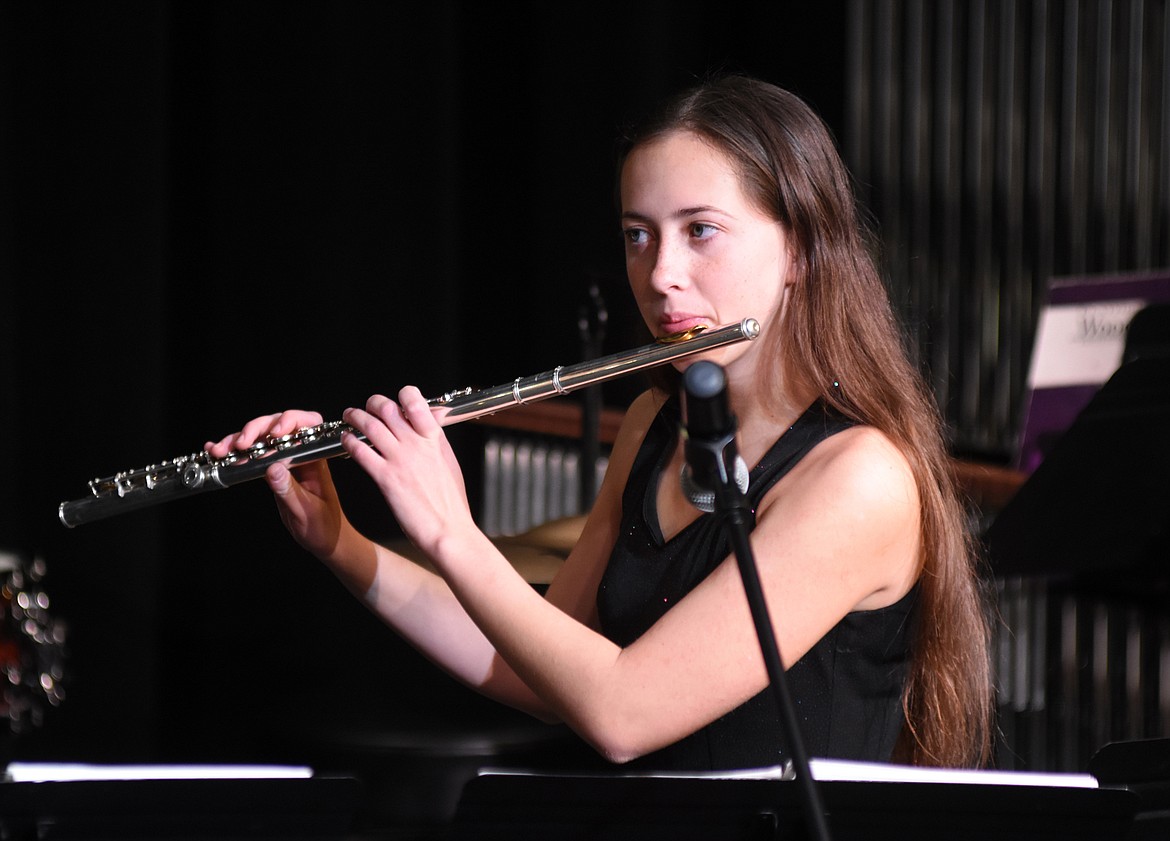 Hunter Grimes plays the flute during a recent performance at Whitefish High School. The high school Percussion Ensembel and Birdland Jazz Combo performed for Muldown Elementary students. (Heidi Desch/Whitefish Pilot)