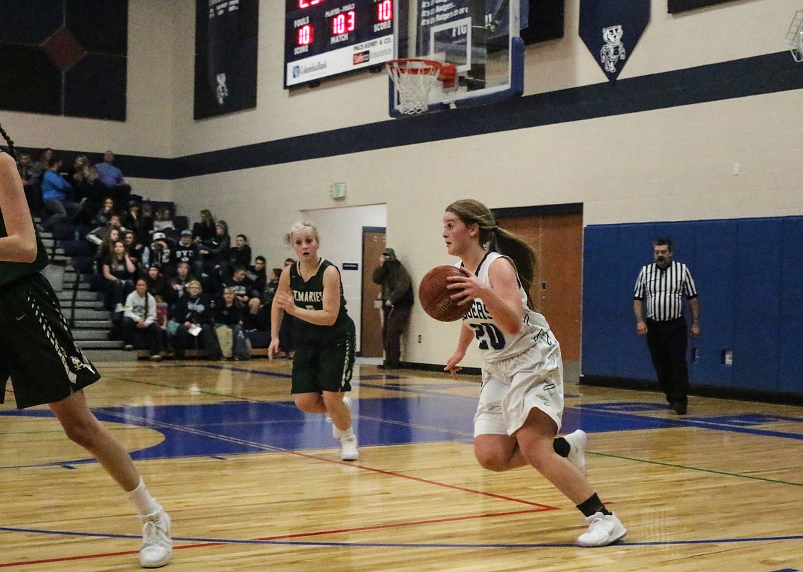 Kadi Bateman takes the ball back to the opposing side of the court. Bateman led Bonners Ferry with 26 points in the Badgers&#146; Nov. 17 season opener.