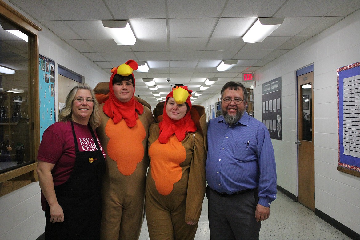 Photo by Tanna Yeoumans
Lisa Carle, Jacob and Makayla Hinson, and Henry Yoder showed their support for the community at the Thanksgiving gathering.