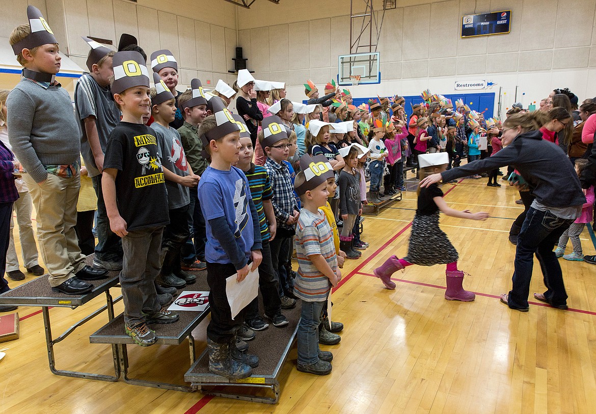 First-graders pose for photos before Tuesday&#146;s performance. (John Blodgett/The Western News)