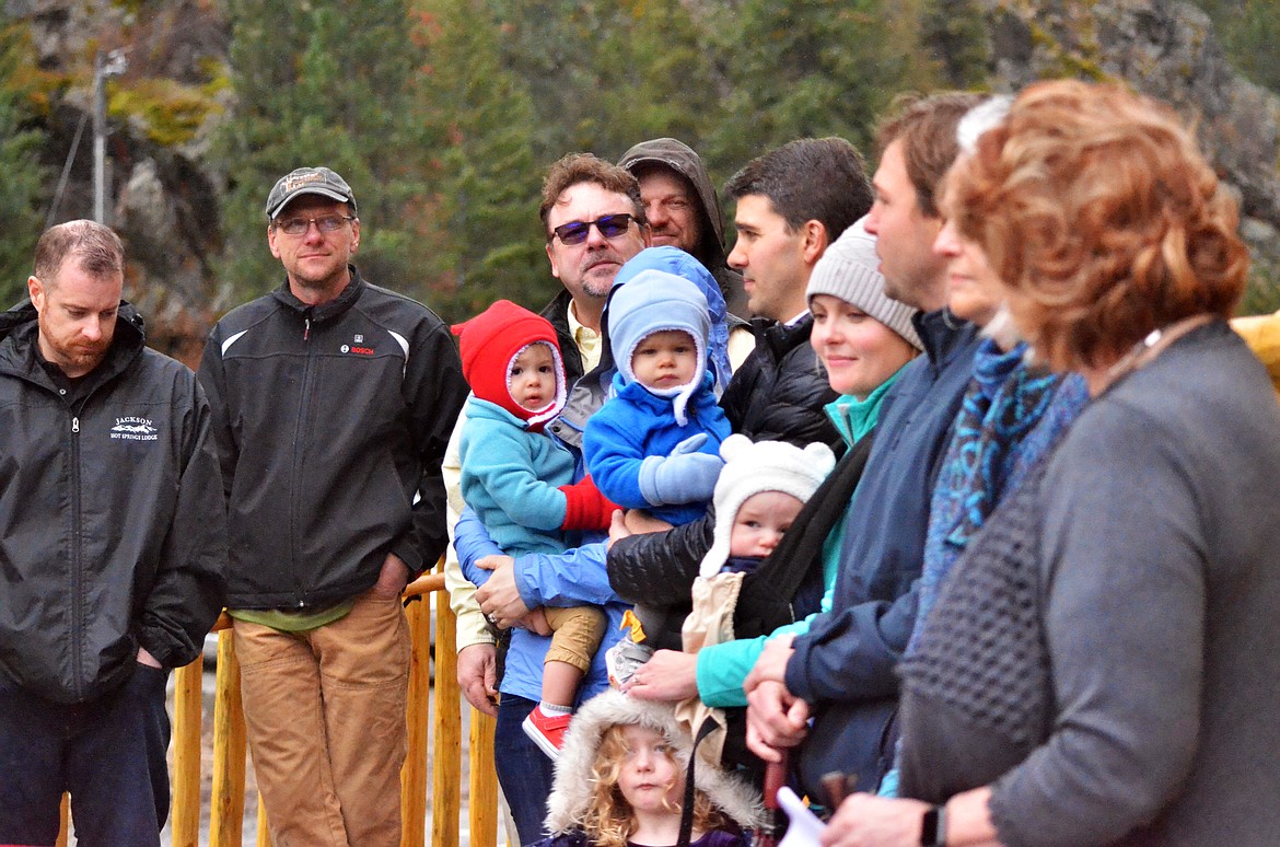 Contractors with Quinns Hot Springs Resorts family and managers ready to welcome the crowd in to see the newly completed lodge (Erin Jusseaume/ Clark Fork Valley Press)