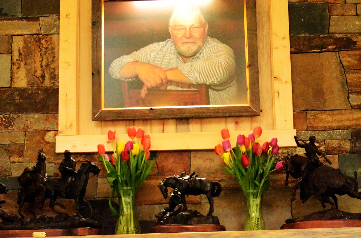 A portrait of Andre J Melief hangs in the main room of the new lodge surrounded by Tulips and bronze statues, reflecting some of his favorite things.