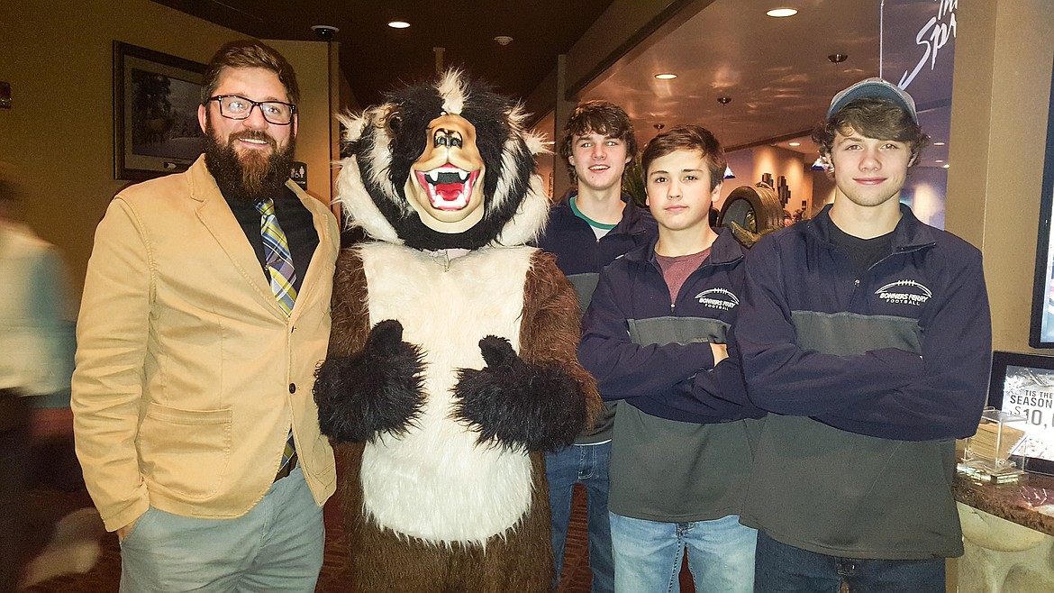 Photo by Mandi Bateman
Bonners Ferry High School Principal Kevin Dinning, Buddy Badger, Nick Lederhos, Kaylee Miller, and Mitch Falck, taking part at The Springs Restaurant for Tip A Badger night.