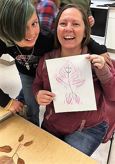 Superior student Haley Kruger and teacher Mrs. Ladd worked on a project together during the afterschool program, which is funded through the 21st Century Learning Community Centers. (Photo by Dawn Bauer)