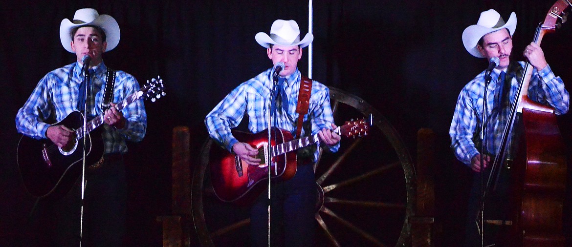 High Country Cowboys (L-R) Marty, John and Joe Kosel. perform at Quinns Hot Springs Resort. (Erin Jusseaume/ Clark Fork Valley Press)