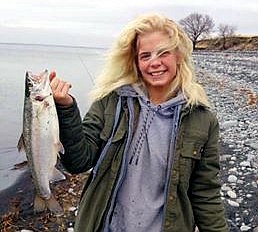 Pete Fisher photo - Johanna Bolling caught this nice Rainbow trout on Medicare Beach.