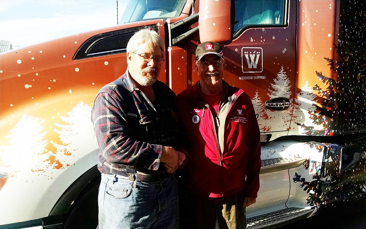 Even fellow local truck drivers like Charlie McCrea couldn&#146;t resist congratulatig Larry and checking out his specially designed Kenworth (Clark Fork Valley Press)