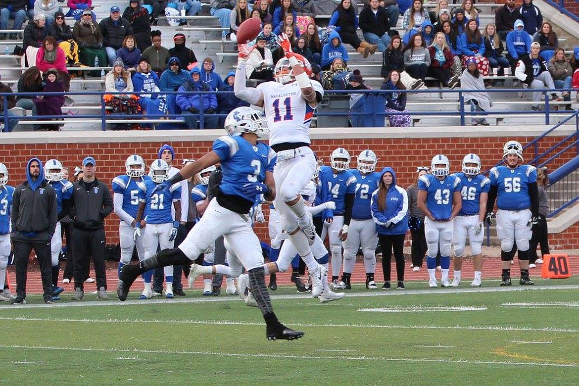 Jack Streibich rises up for one of his 13 catches against Illinois College earlier this month. Streibich&#146;s 13 catches tied the school record for most in a game. (Photo courtesy of Alison Hodges)