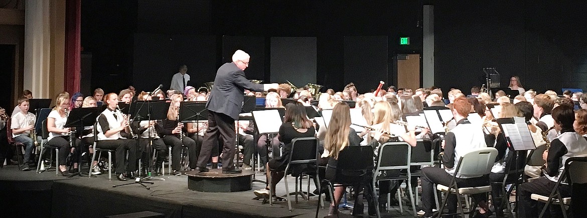 Guest conductor Dr. Thomas Cook directed area band students for the Mission Valley Band Festival held Nov. 14 in Ronan before a packed auditorium at the Performing Arts Center. (Photo by Ashley Fox)