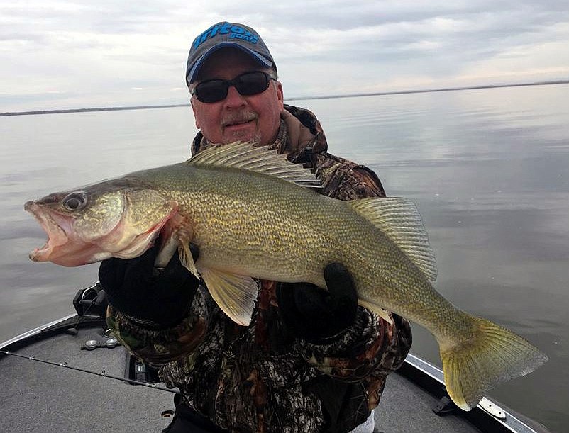 Pete Fisher photo - Steve Brady of Othello with a nice Potholes Reservoir walleye caught on blade bait.