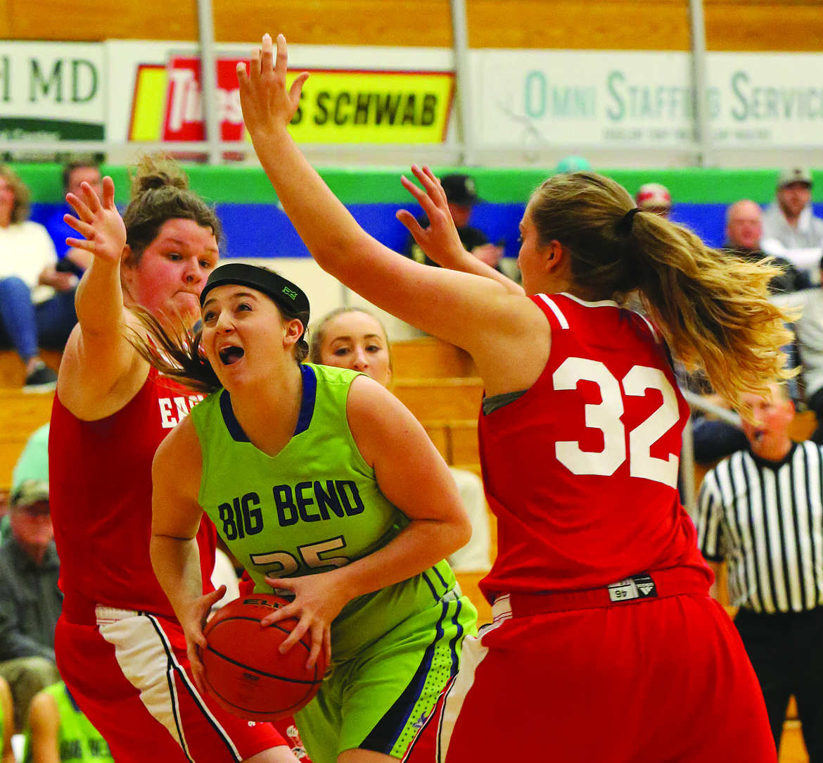 Connor Vanderweyst/Columbia Basin Herald
Big Bend forward Kelsey Foster tries to put up a shot between two EWU Club defenders.