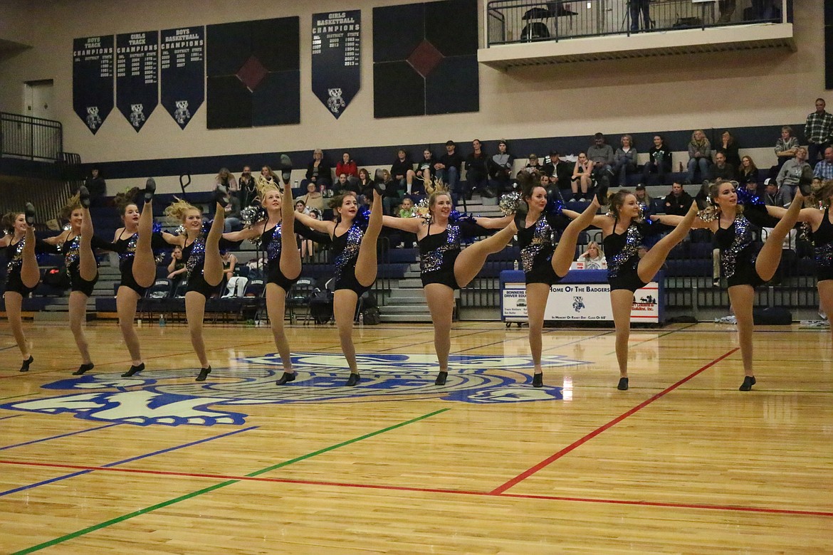 Photo by Mandi Bateman
The Badgerettes perform a kick line during halftime at the girls basketball game.