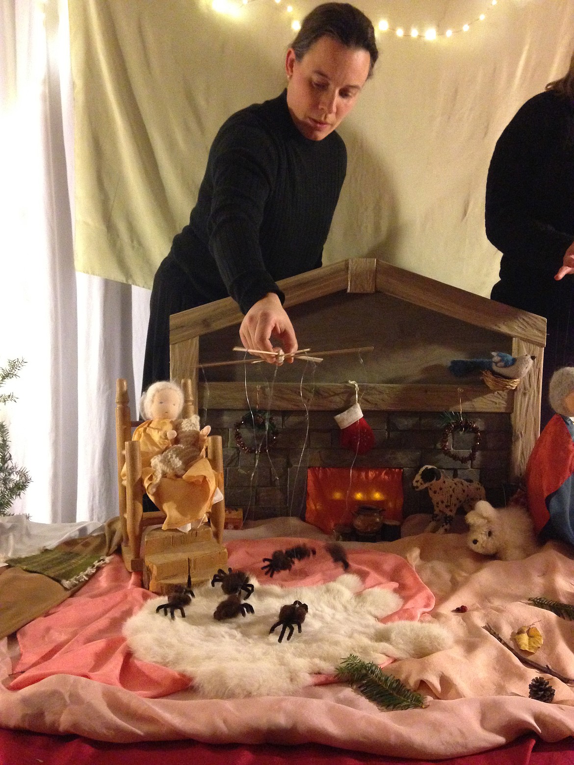 (Photo courtesy SANDPOINT WALDORF SCHOOL)A puppeteer manuevers tiny &quot;actors&quot; during a puppet show at a past Christmas Faire at Sandpoint Waldorf School.