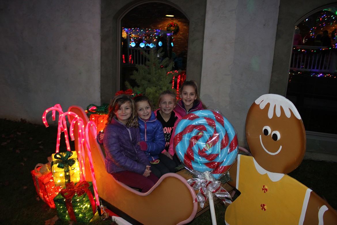 Photo by Tanna Yeoumans
Sadie Newhouse and Callie, Taren, and Lexi Bateman posed for a photo in the sleigh.