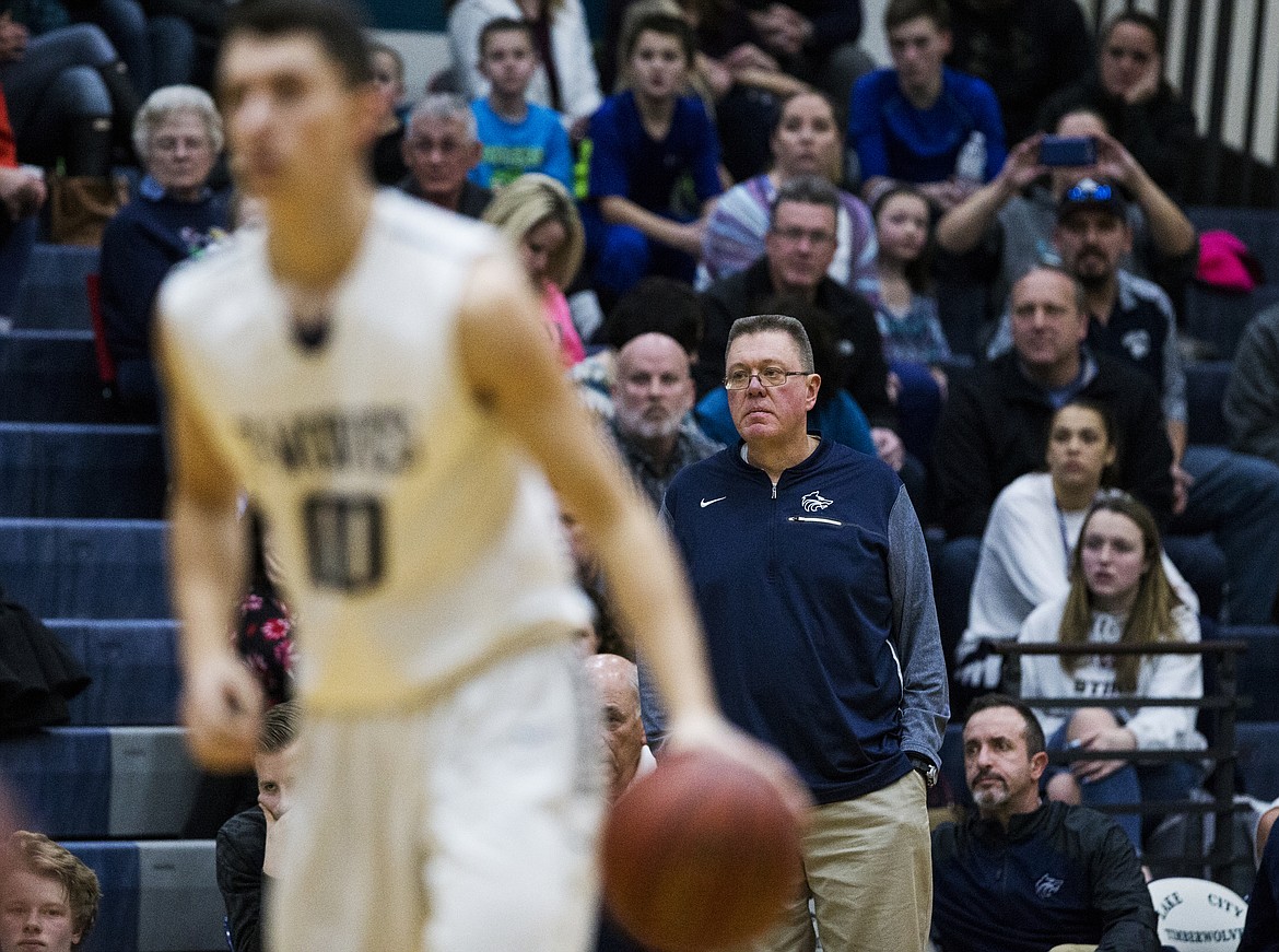 LOREN BENOIT/Press

Lake City Head Coach Jim Winger keeps a close eye on his team during Friday night&#146;s game.