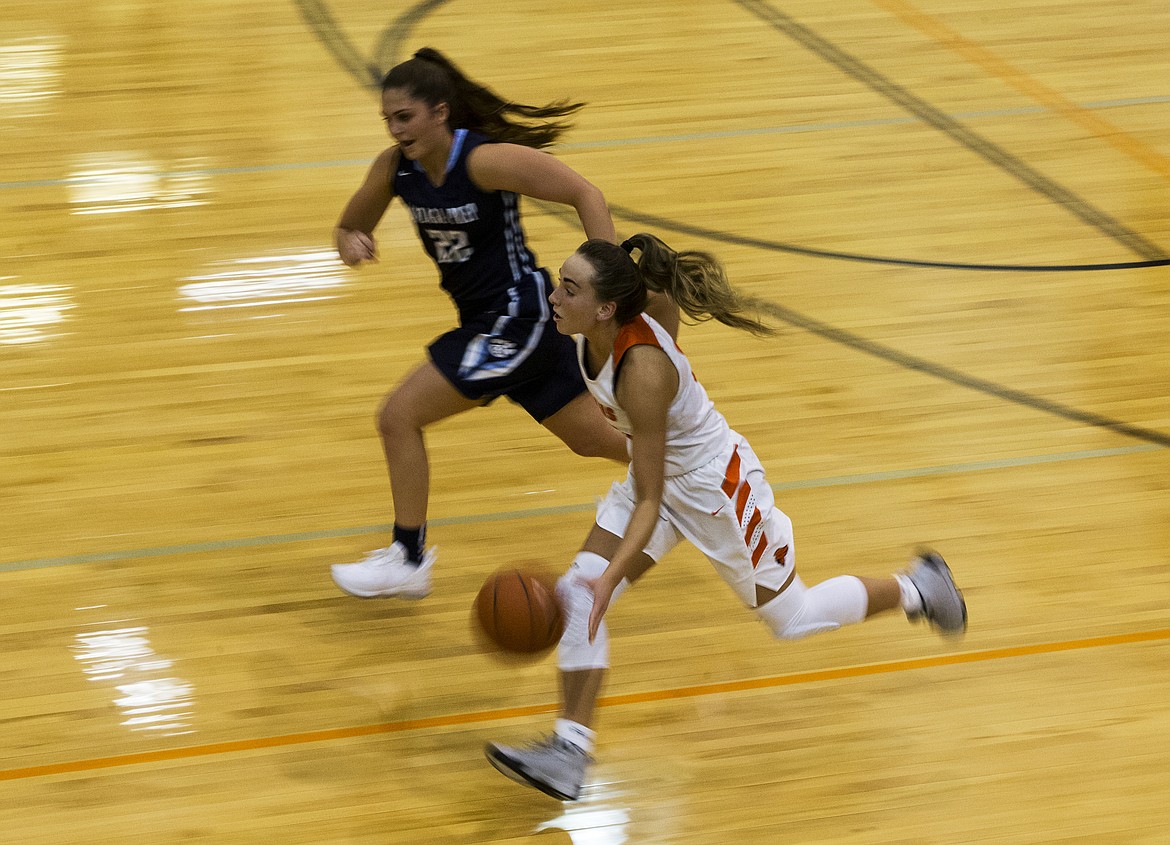 LOREN BENOIT/PressBayley Brennan dribbles the ball pass half-court against Gonzaga Prep Thursday night at Post Falls High School.