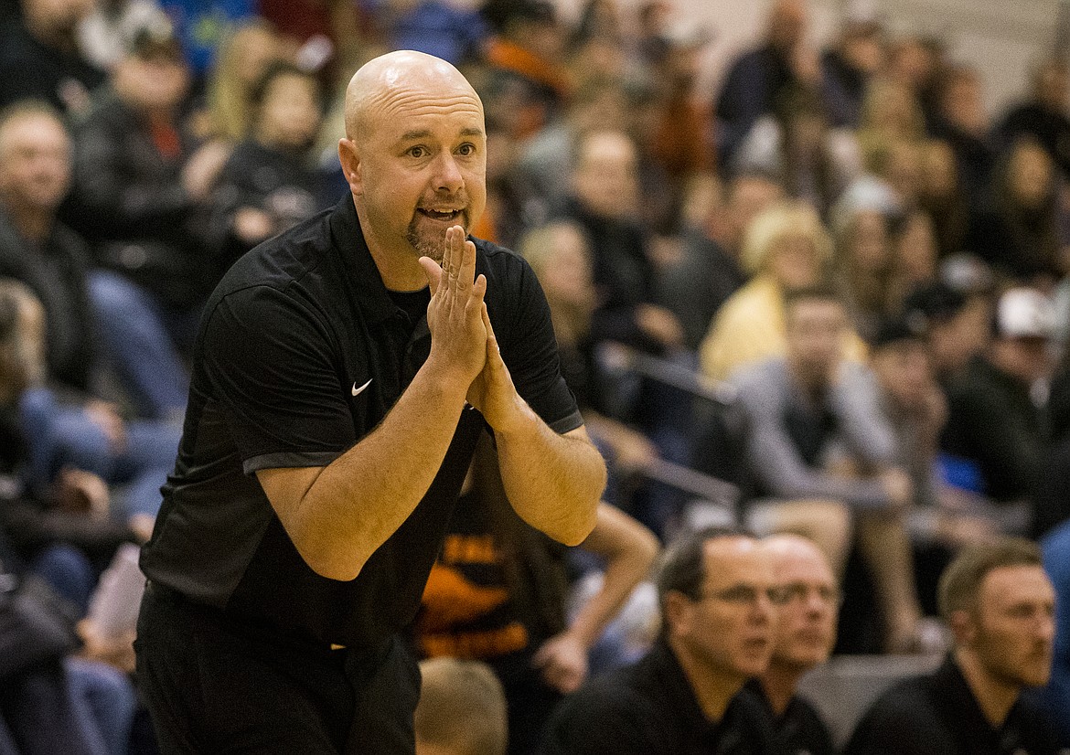 LOREN BENOIT/PressPost Falls Head Coach Mike McLean gives directions to his team as they play against Gonzaga Prep Thursday night at Post Falls High School.