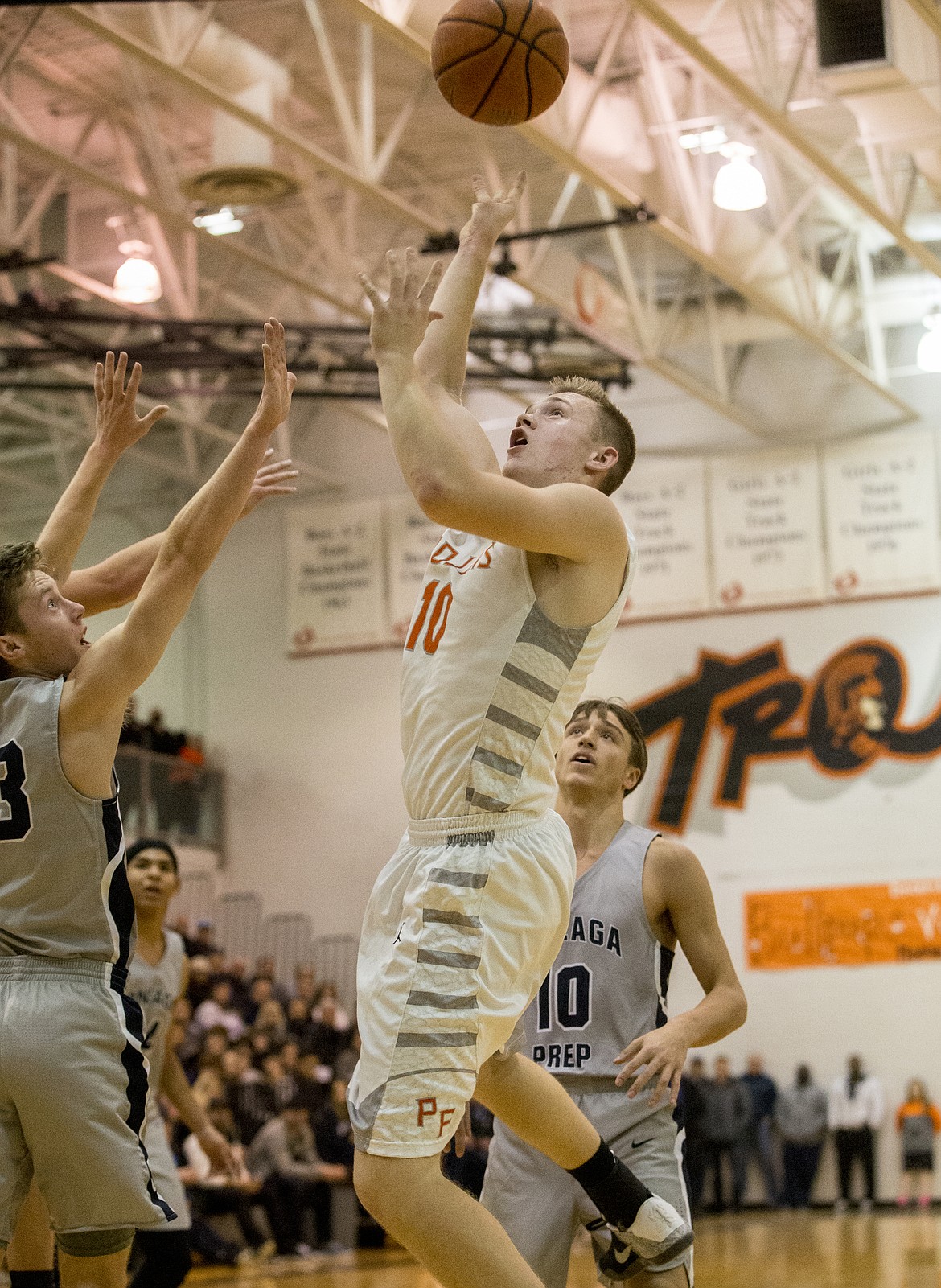 LOREN BENOIT/PressTanner McCliment-Call goes for a layup against Gonzaga Prep Thursday night at Post Falls High School.