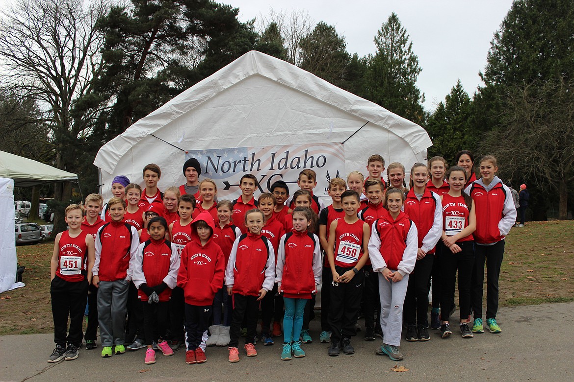 Courtesy photo
North Idaho Cross Country runners, coached by Erin Lydon Hart, will compete in the USA Track and Field National XC Championship on Dec. 9 in Tallahassee, Fla. The 2017 NIXC team: front row from left, Jasmine Gutierrez, Alistair Smith, Olivia May, Olivia Abbey, Ethan Hickok and Neala Hart; second row from left, Alex Jones, Zack Cervi-Skinner, Sam Mandel, Lars Bazler, Helen Oyler, Mitchell Rietze, Zara Munyer, Max Cervi-Skinner, Lachlan May, Fiona Hart and Georgia May; third row from left, Max Anderson, Jenny Elliott, Emersen Duncan, Ara Clark, Max Bazler, Jesus Gutierrez Jr., Spencer Clark III, Lauren Forster, Dorothy Gallus, Lilian Smith and Gracie Averill; and back row from left, Devyn Pirwitz, Carter Gordon, Richard Abbey, Braden Dance and coach Erin Lydon Hart. Not pictured is Elizabeth Smythe.