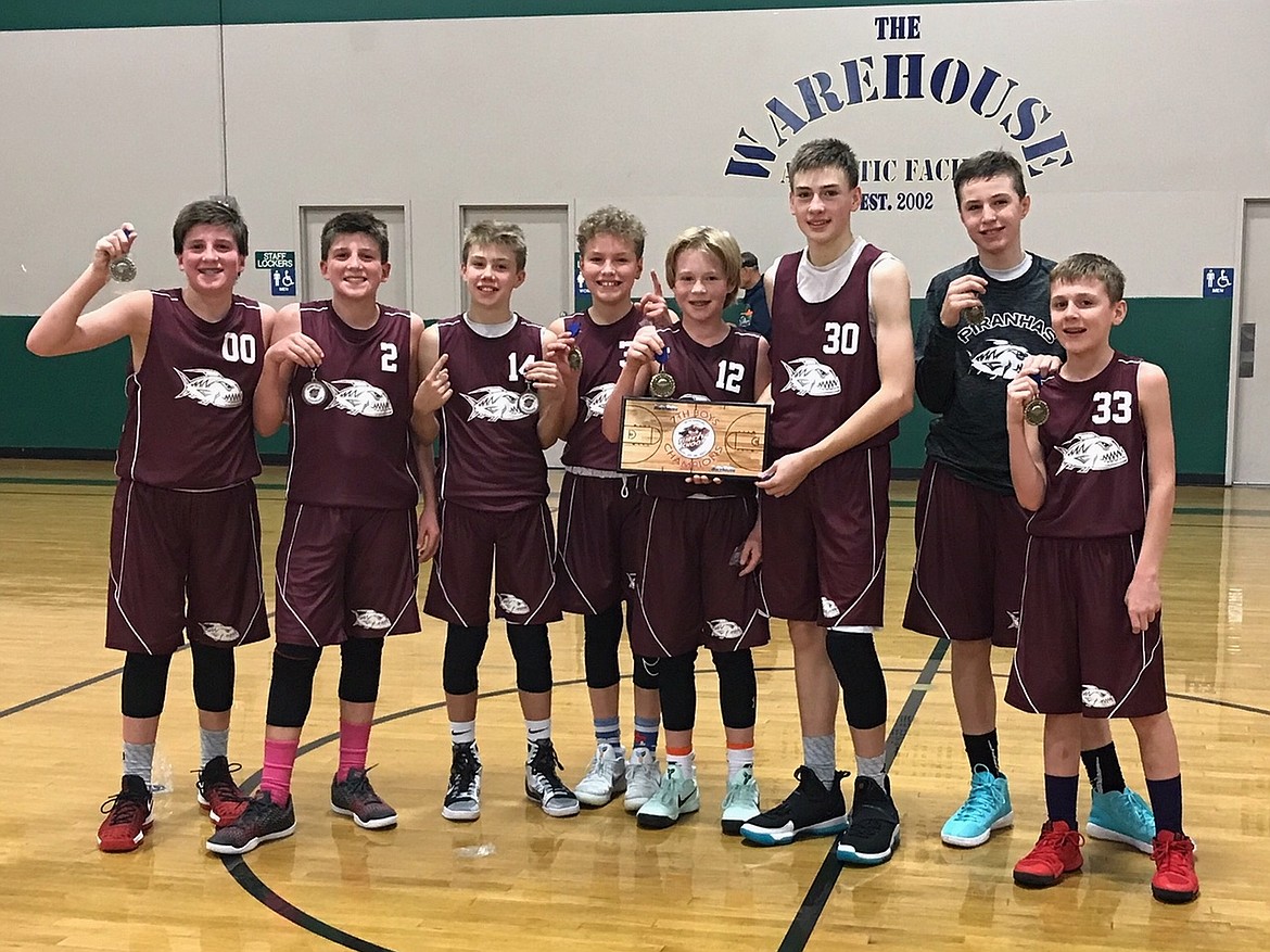 Courtesy photo
The Piranhas won the seventh-grade boys division of the Spokane AAU Turkey Shoot basketball tournament held Nov. 25-26. From left are Kolby Luna, Riply Luna, Kolton Mitchell, Deacon Kiesbuy, Brody Beebe, Zach Johnson, Varick Meridith and Reed Whatcott. Not pictured are Jacob Thompson and coach Kelly Reed.