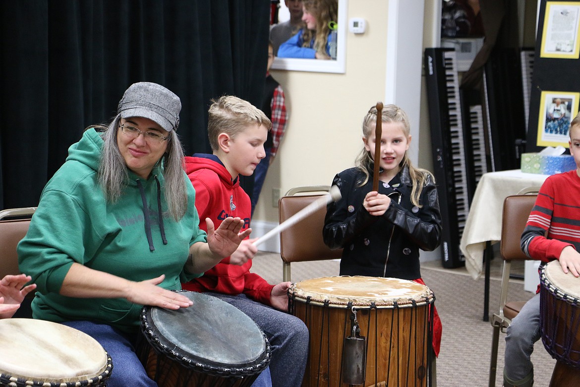 (Photo by MARY MALONE)
Home School Academy students showed off their drumming talents during Wednesday's &quot;All School Revue&quot; in the Music Conservatory of Sandpoint.