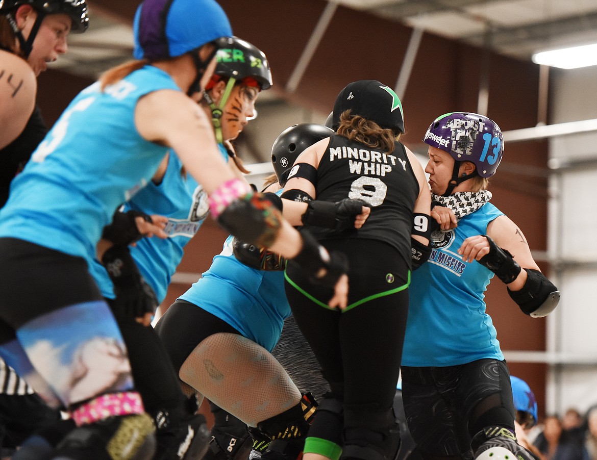 Danika Pietron (Shotta Patron) blocking a Jammer during the match against the Snake Pit Derby Dames of Coeur d&#146;Alene on Saturday, November 18, at the Flathead County Fairgrounds.(Brenda Ahearn/Daily Inter Lake)