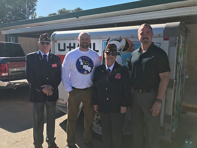 (Courtesy photo) 
Clark Fork High School teacher KC MacDonald, second from left, sports an 'Operation Wampus Cat' shirt as he poses next to the trailer filled with nearly 500 pounds of school supplies in Texas last week. The donations were collected in North Idaho and delivered to Jessup Elementary School in Houston with the help of veterans across four states. From left, veteran Terry Contella, MacDonald, veteran Inge Conley, and Jessup Prinicipal Ryan Pavone.