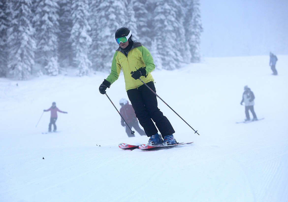 A skier cruises down Whitetail during opening day, Thursday, Dec. 7. (Mackenzie Reiss/Daily Inter Lake)