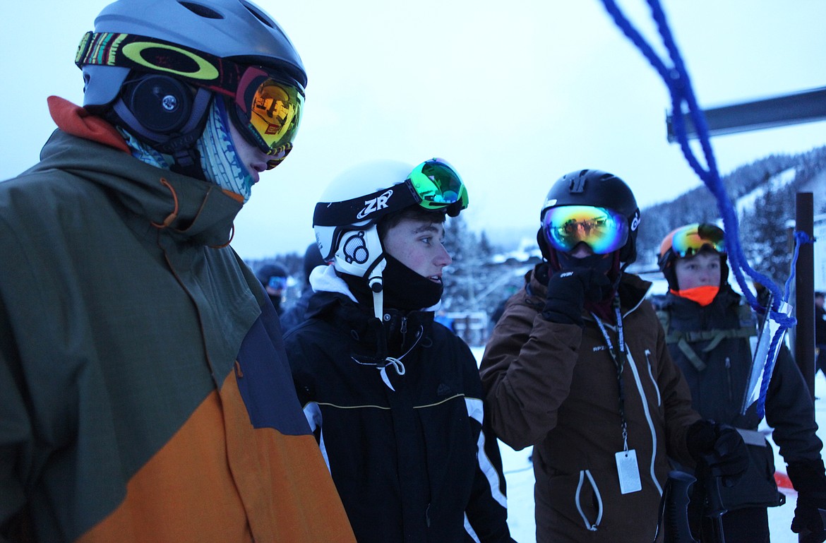 Brandon Pyron, 17, of Kalispell, Gage Magone, 17, of Kalispelll and Braden Nitschelm, 14 of Kalispell  are first in line for Chair 1 at Whitefish Mountain Resort on opening day, Dec. 7. (Mackenzie Reiss/Daily Inter Lake)