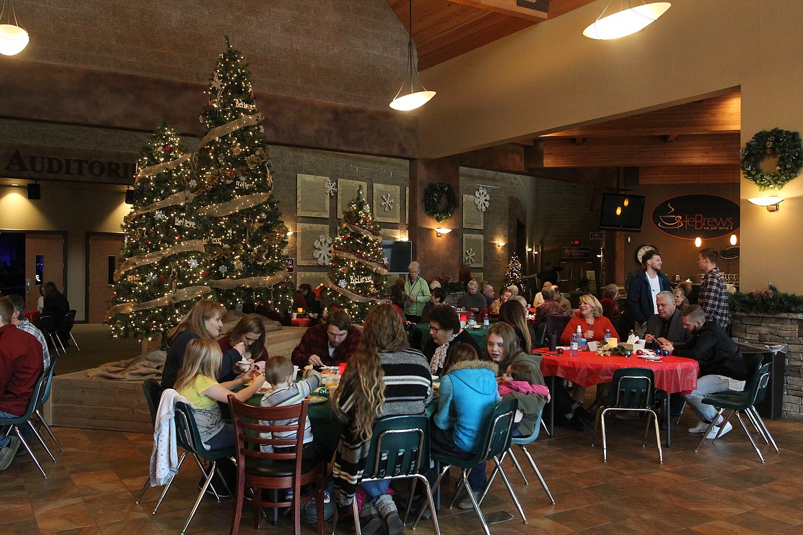 Friends and families gathered for breakfast in Lake City Church in Coeur d&#146;Alene on Saturday morning before the 14th annual Ceremony of Remembrance. At least 100 people attended the ceremony to honor the memories of loved ones who have passed away. (DEVIN WEEKS/Press)