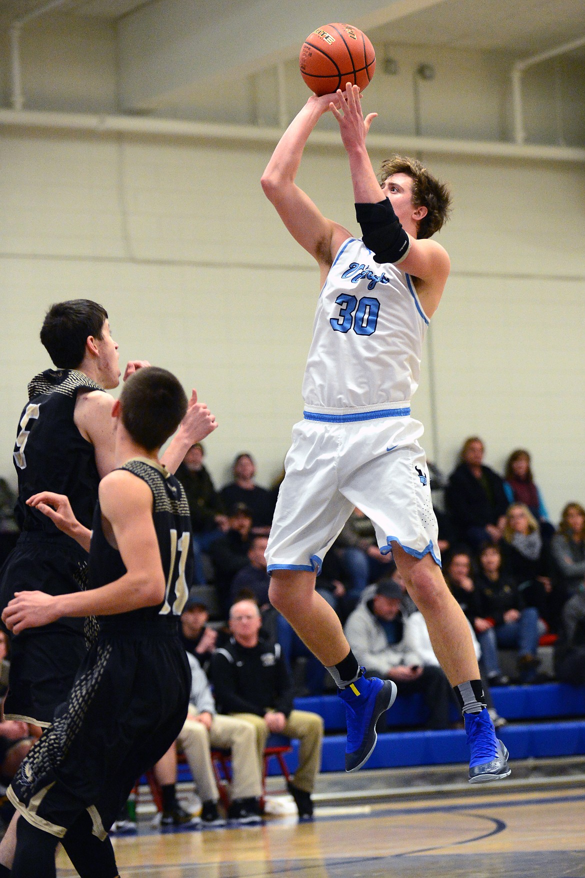 Bigfork's Logan Gilliard pulls up in the lane for two points against Seeley-Swan on Tuesday night in Bigfork. (Casey Kreider/Daily Inter Lake)