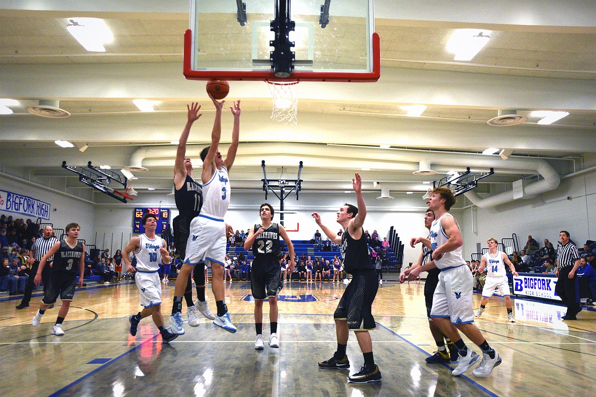 Bigfork's Colton Reichenbach (3) puts in two points against Seeley-Swan on Tuesday night in Bigfork. (Casey Kreider/Daily Inter Lake)