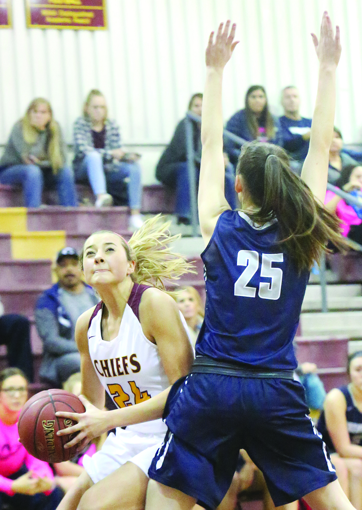 Connor Vanderweyst/Columbia Basin Herald
Moses Lake guard Madisyn Clark tries to shoot past Chiawana's McKenna Kaelber.