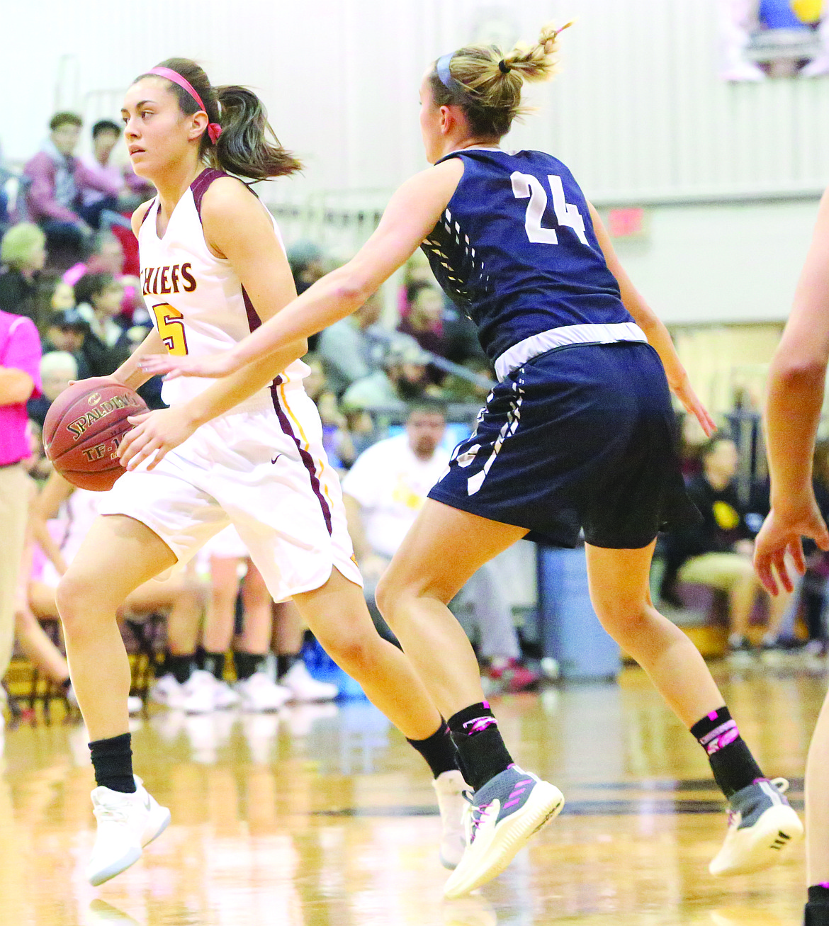 Connor Vanderweyst/Columbia Basin Herald
Moses Lake guard Jamie Loera tries to dribble around Chiawana's Kenedy Cartwright.