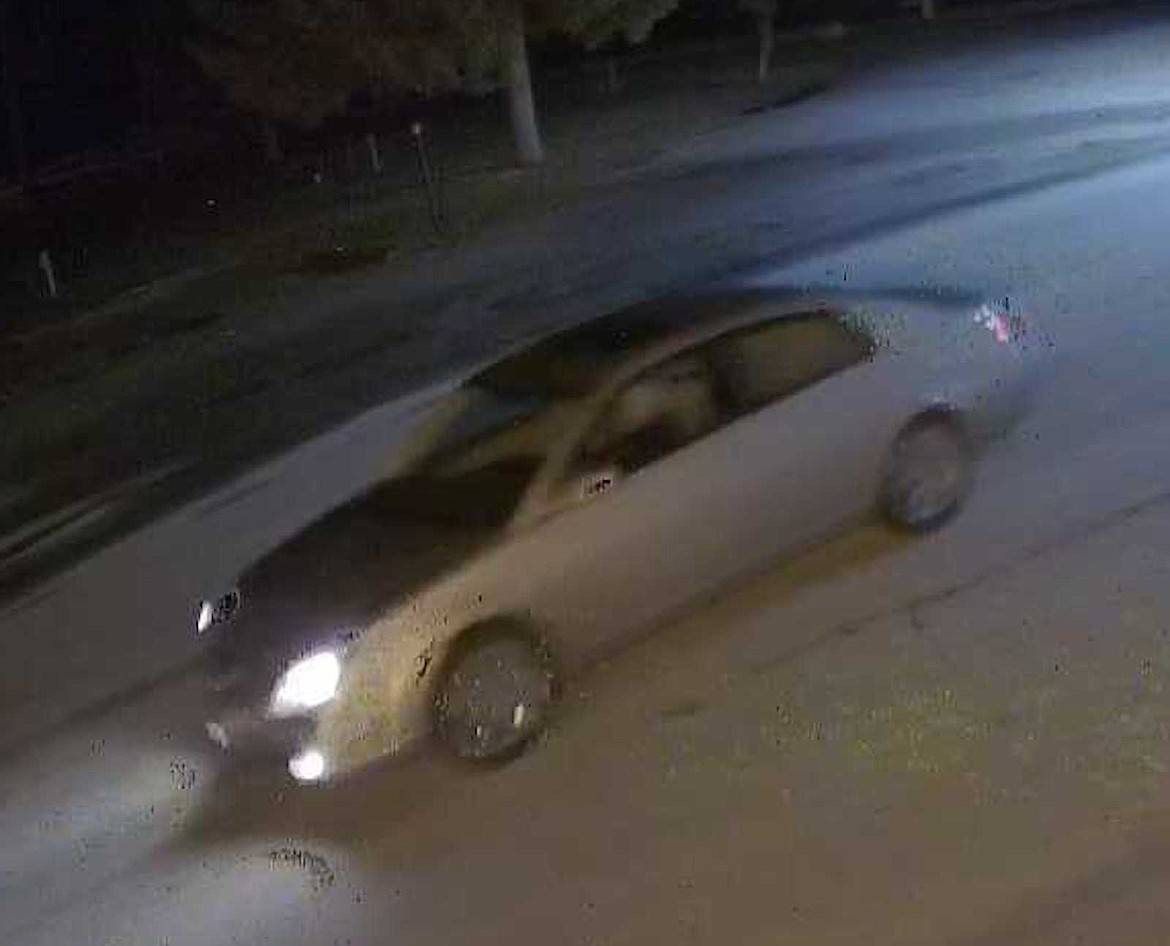 (Photo courtesy PONDERAY POLICE DEPT.)
One of the suspect vehicles, driven by a woman, appears to be a Toyota Avalon-style sedan.