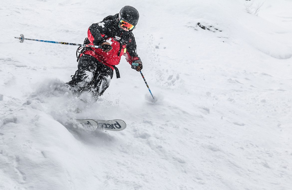 Ski patroller Kate Atha skis down Whitefish Mountain. (Whitefish Mountain Resort)