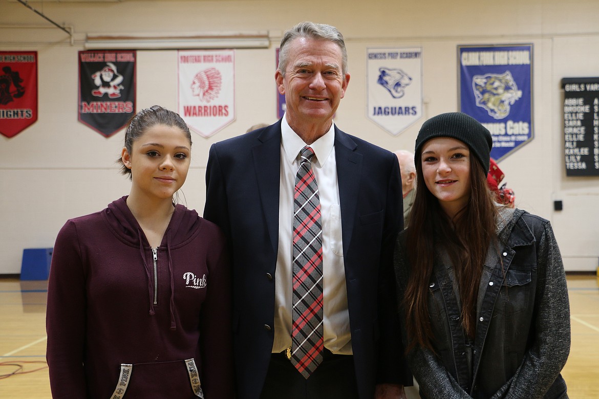 (Photo by MARY MALONE)
Clark Fork High School freshmen Sierra Swales-Tally, left, and Leslie Montgomery, right, pose with Lt. Gov. Brad Little Thursday as CFHS as he made his rounds through the local high schools.