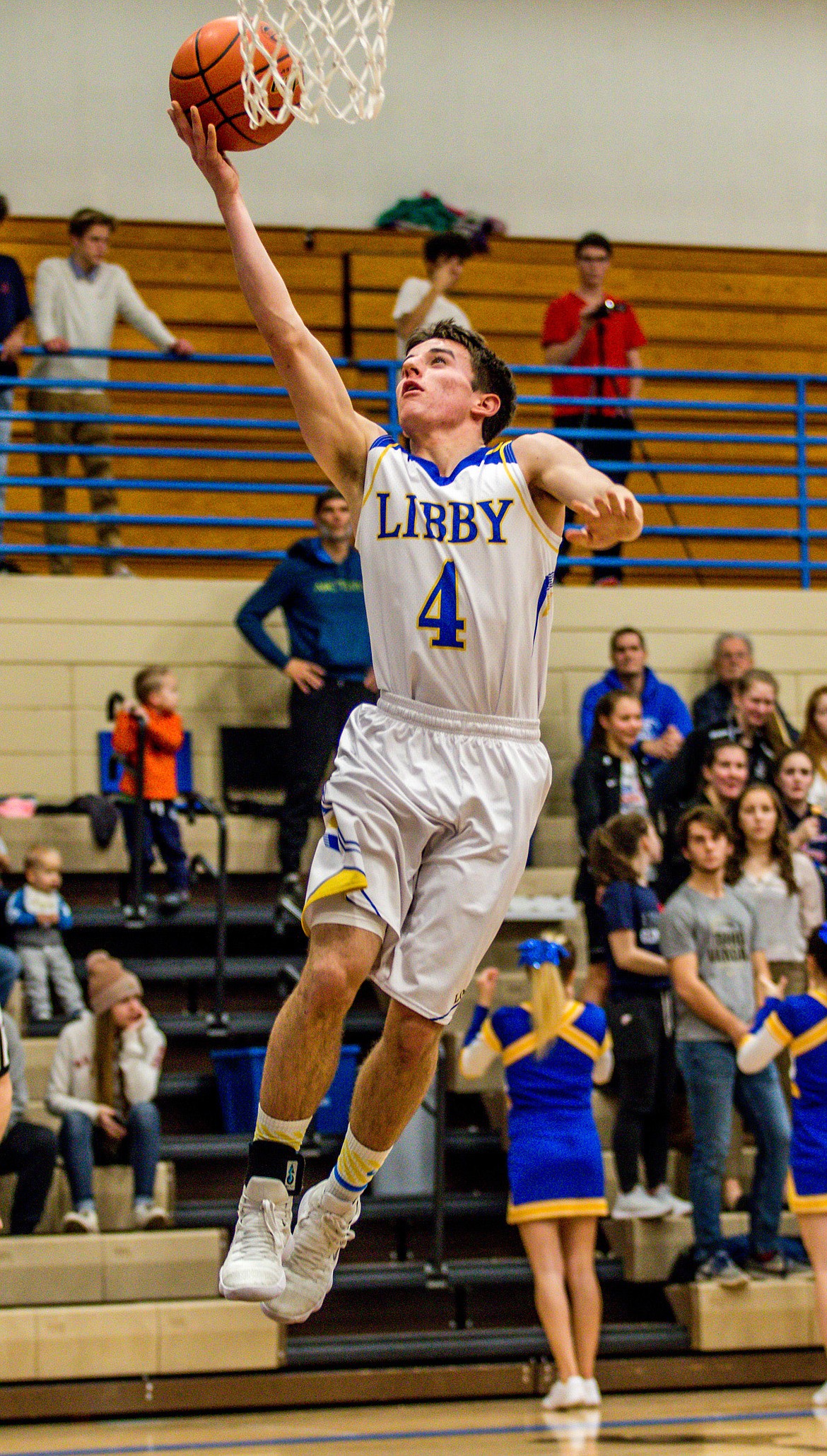 Libby&#146;s Brian Peck goes for two points in the first quarter Saturday. (John Blodgett/The Western News)