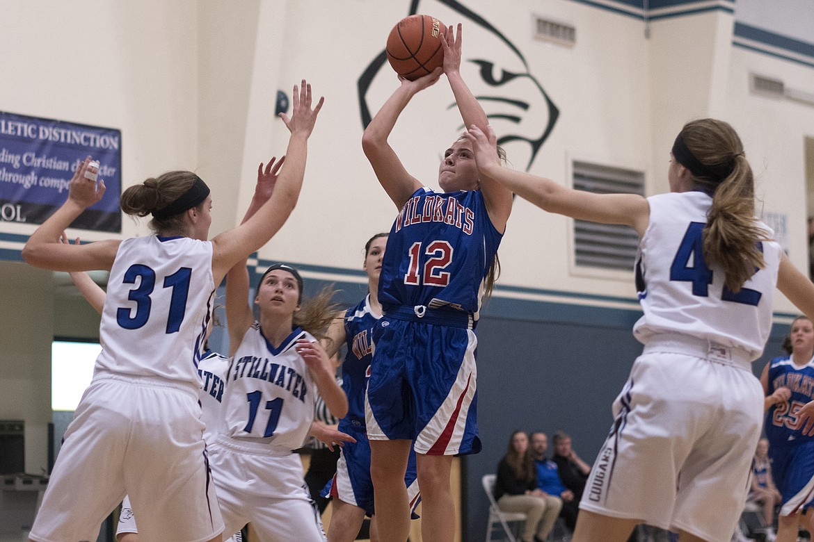 LaKia Hill pulls up for a jumper in the middle of the Stillwater Christian defense Saturday. (Jeremy Weber photo)