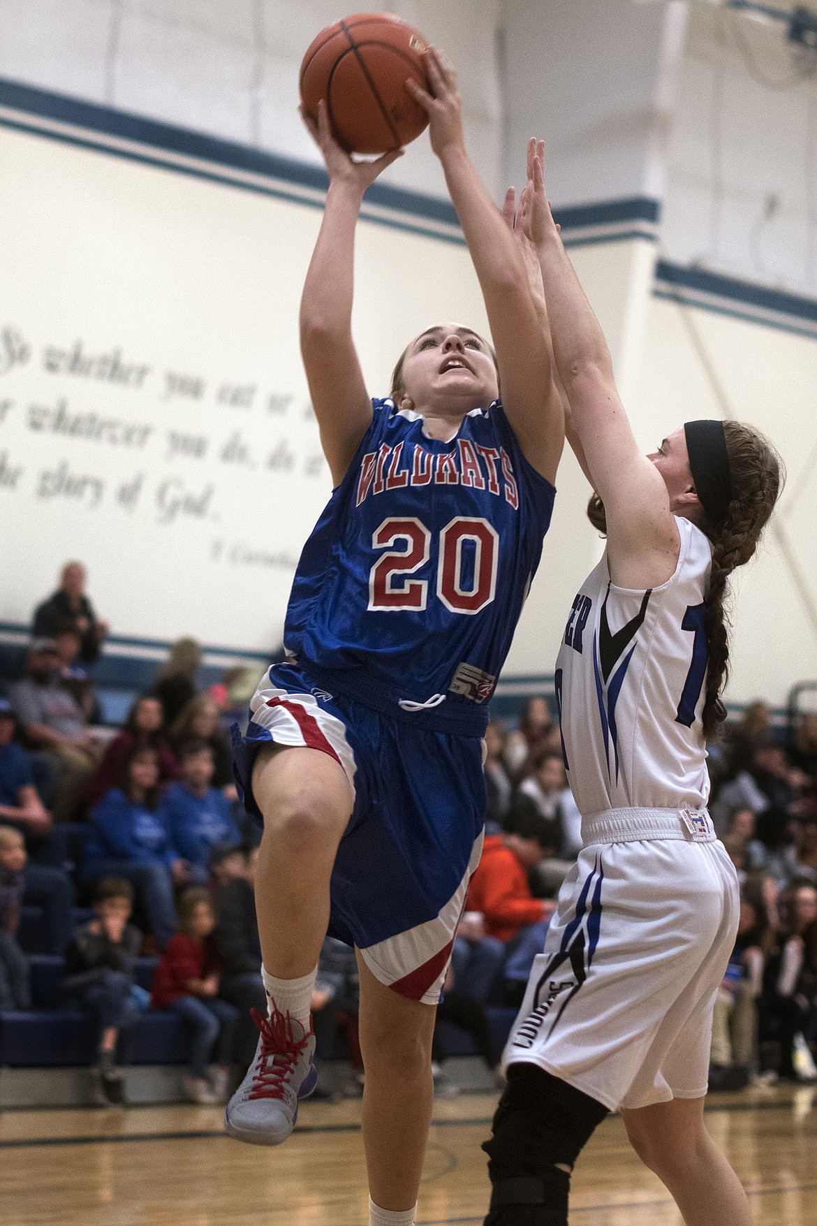 Peyton Rhodes scores in the lane against Stillwater Christian Saturday. The Wildkats pulled out a win in a close game against the Lady Cougars. (Jeremy Weber photo)