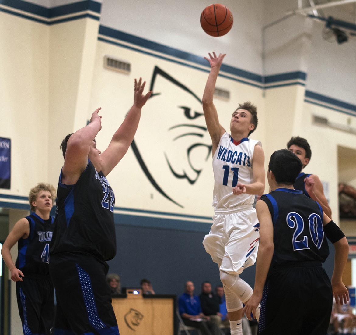 Tucker Salmonsen puts up a runner against the Stillwater Christian defense Saturday. Salmonsen scored four points in the Wildcat win. (Jeremy Weber photo)