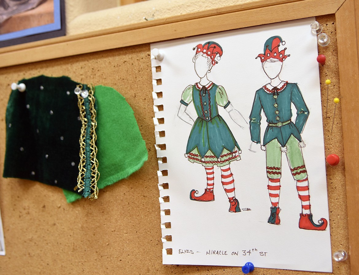 Sarah Bell&#146;s sketch for the elf costumes for the Whitefish Theatre Company&#146;s production of &#147;Miracle on 34th Street&#148; hangs in the costume room alongside a swatch of fabric for the costumes. (Heidi Desch/Whitefish Pilot)