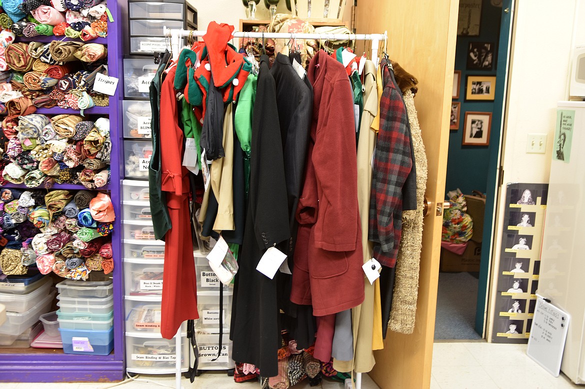 A rack of costumes waiting for final touches sits inside the costume room at the O&#146;Shaughnessy Center. (Heidi Desch/Whitefish Pilot)