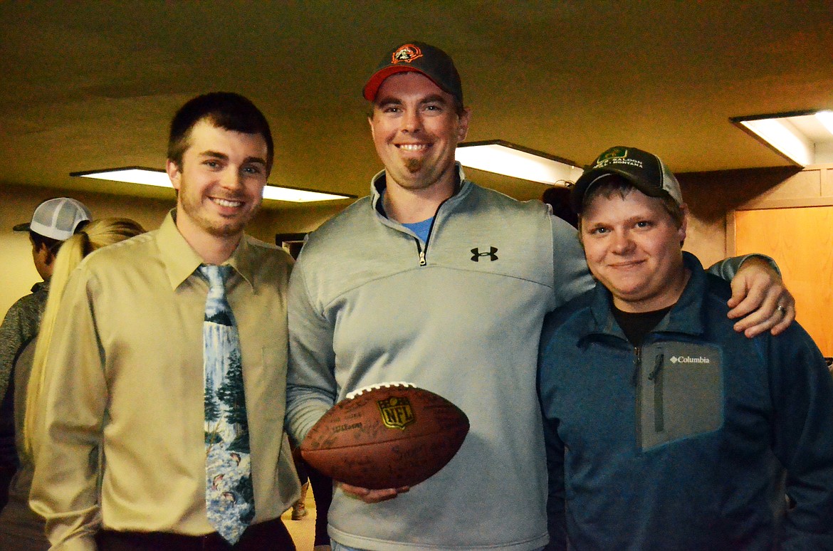 Horsemen football head coach Eddie Fultz, center, with assistant coaches Jaron Laws, left, and Carson Lilja. (Erin Jusseaume/ Clark Fork Valley Press)