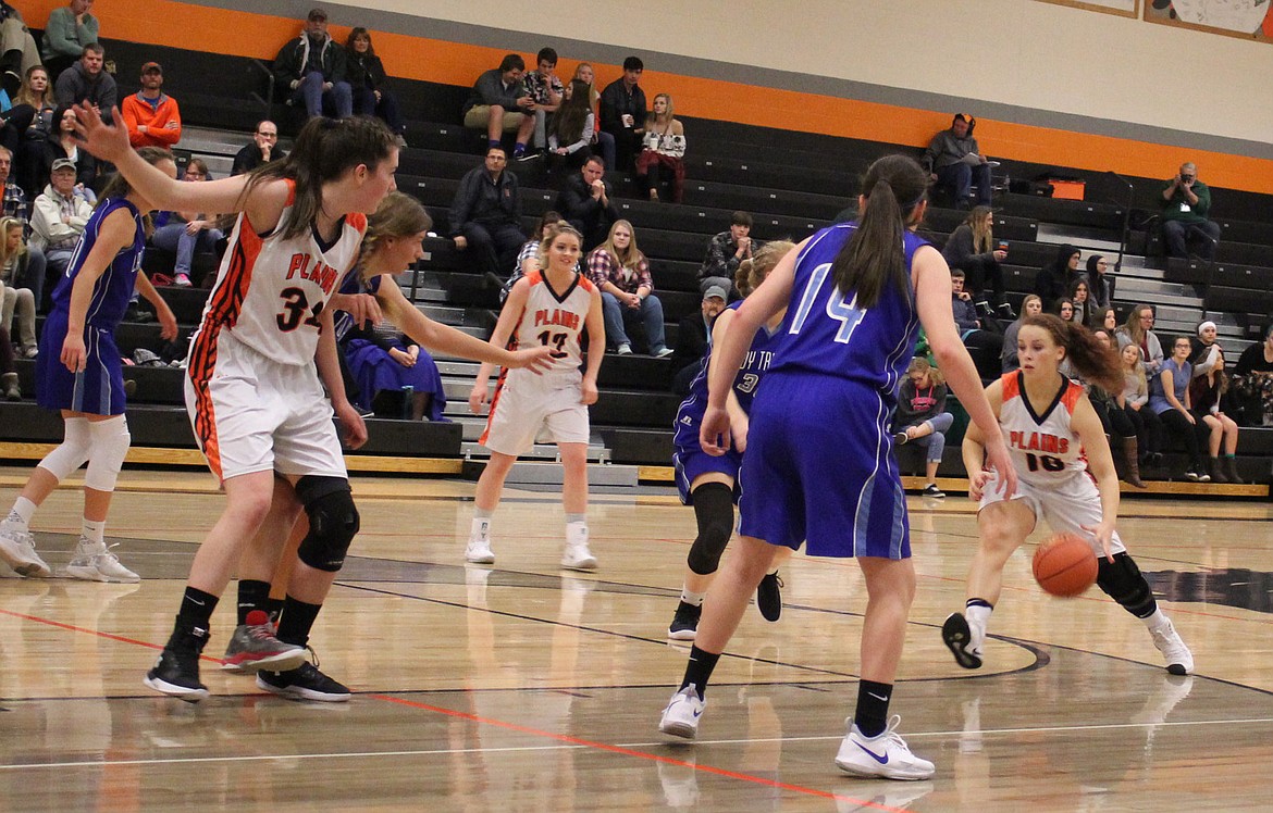 Kassidy Kenzie (10) of Plains attempts to get through the Drummond defense (Kathy Woodford/ Mineral Independent)