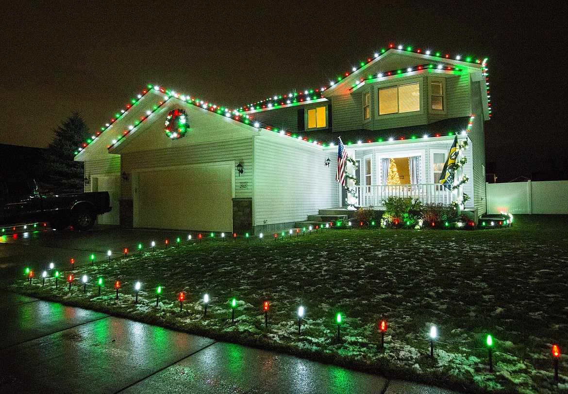 (LOREN BENOIT/Press)

More than 300 feet of LEDs light up Donald and Courtney Sohler&#146;s house Thursday night in Coeur d&#146;Alene. Donald&#146;s wife nominated her family for the Decorated Family Program, a national program that was created by Christmas Decor to thank our country&#146;s soldiers.