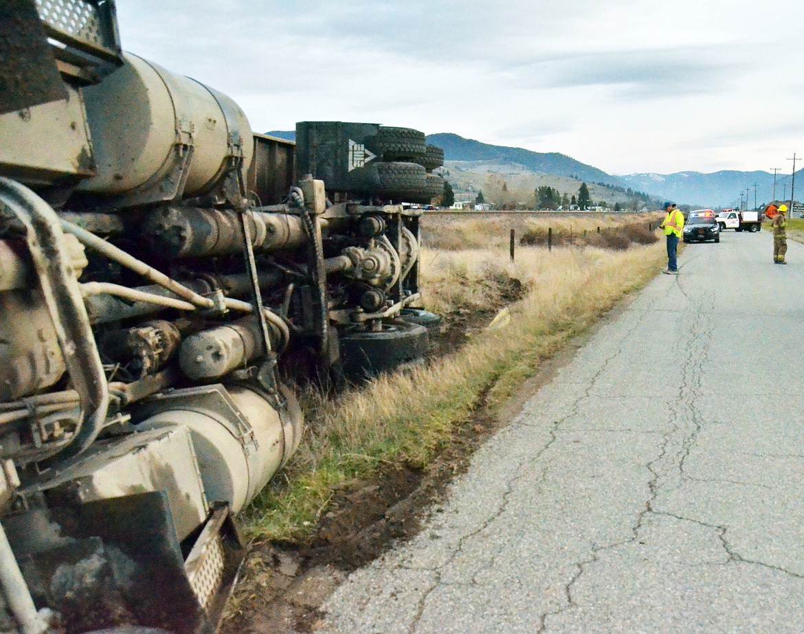 The dump truck slide along the soft edges of the road before it came to a stop (Erin Jusseaume/ Clark Fork Valley Press)