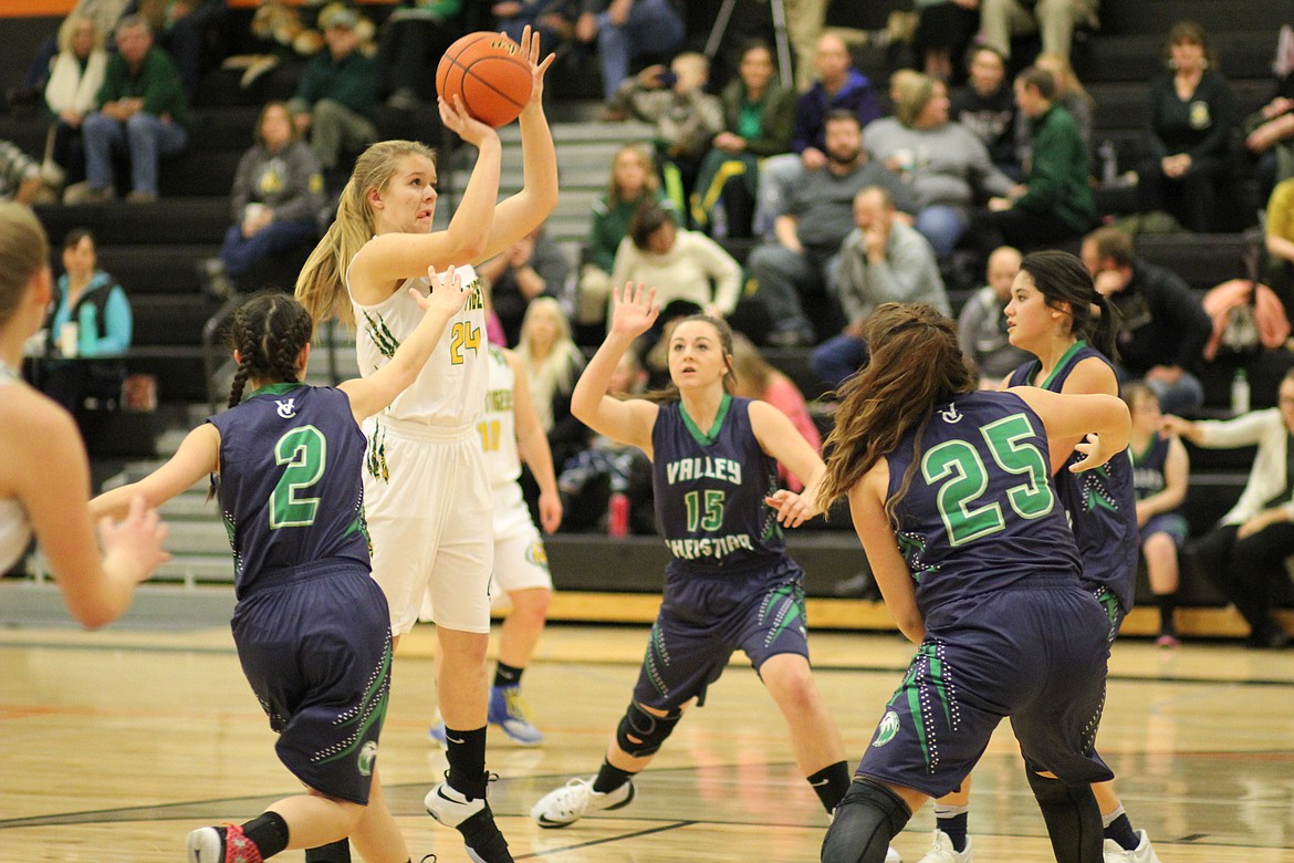 St. Regis freshman, Chloe Cielke, takes aim for a free throw during Friday&#146;s game against Valley Christian where they won 54 to 6 at the Tip-Off Tournament in Frenchtown. (Kathleen Woodford/Mineral Independent).