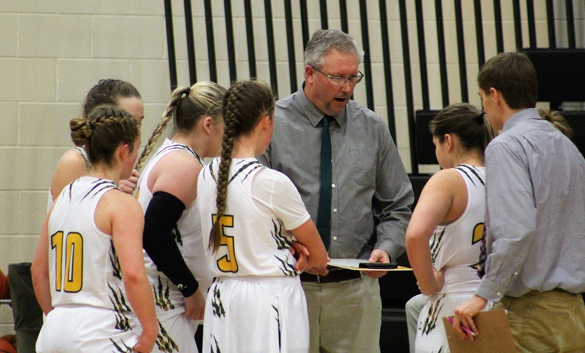 Head Coach Brooks Sanford talks to his team during a game in Frenchtown. He said his team is looking good this year with a possible 14C District Championship. (Kathleen Woodford/Mineral Independent).